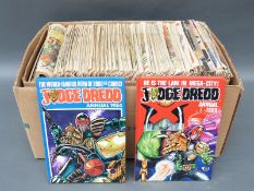 A box of 2000AD featuring Judge Dredd comics and annuals
