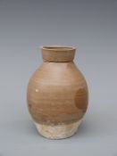 A Chinese carafe, olive glazed porcelain, height 11cm,