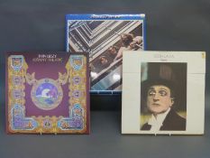 Approximately 40 LPs mostly rock including The Beatles (Red and Blue), Thin Lizzy,