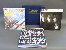 The Beatles collection blue box set comprising 15 LP's, condition of vinyl appears excellent,