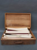 A large wooden case of coloured,