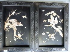 A pair of mother of pearl and bone Shibayama panels decorated with birds and filigree (54 x 38cm)