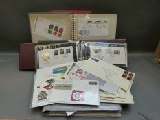 A box of all world first day covers