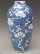 A Chinese vase with prunus decoration 38cm tall
