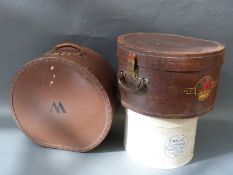 A 'British Made' tan leather hat box with British Rail and Orient Express labels plus two others,