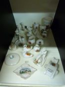 A collection of crested china to include WWI tank by Willow, machine gun turret by Arcadian, ship,
