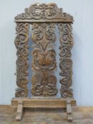 A 19thC carved oak screen (H88 x W55cm)