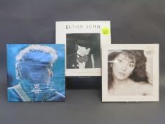 Approximately 50 LPs, mixed rock and pop,