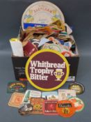 A large collection of vintage beer mats including Norseman and Whitakers of Halifax etc and trade