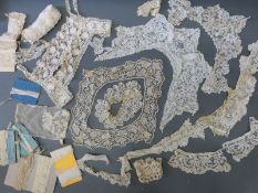 A collection of 19thC textiles to include cotton lace collars, lace trim,