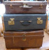 An ash bound trunk, leather suitcase and tin trunk.