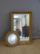 Two gilt framed mirrors, largest approx. 94cm long.