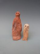 Two Anthony Gormley figures