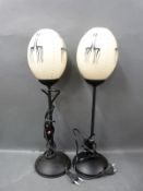 A pair of Kenyan ostrich eggs converted into lamps.