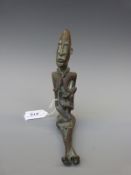 An African bronze/brass figure of a seated mother and child,