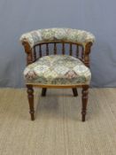 An upholstered captain's style chair