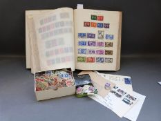 A George VI stamp album and contents,
