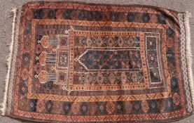 A Persian rug on brown ground 140cm x 90cm