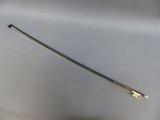 An unnamed violin bow in ebonised finish with abalone and ivory frog and tip