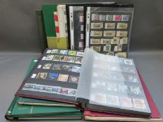 A box of albums of all world stamps,