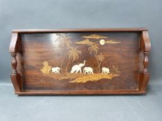 A Japanese rosewood tray with inlaid bone and specimen wood detail of elephants and forest