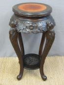 A 19thC/20thC marble inset carved padauk table with undershelf (H76 x dia 60cm)