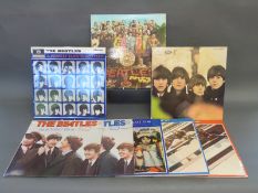 Eight Beatles re-iisue LPs including Sgt Pepper, For Sale, Hard Days Night, Ballads,