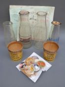 Four vintage milk bottles with dairy names together with other milk related ephemera including a