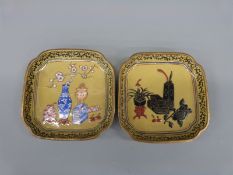 A pair of 19thC Chinese enamel dishes one with scholars attributes decoration,