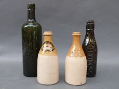 A collection of 19thC and later glass and stoneware bottles to include Newport, Rippon, R .