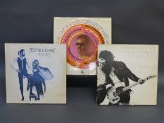 Approximately 80 LPs in various conditions includes Bruce Springsteen, Fleetwood Mac,
