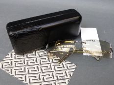 A pair of Versace ladies sunglasses