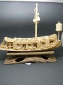 A laet 19th/early 20thC Chinese carved ivory model of a ship, signed,