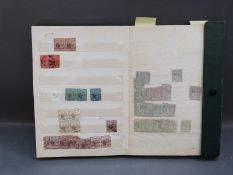 A stockbook of Mauritius stamps including mint blocks