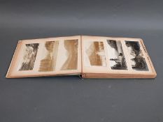 A vintage photograph and picture album c1920s comprising extract from liner Empress of France to