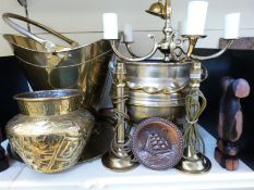 A collection of brassware to include a coal scuttle, chandelier, candle sticks,