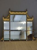 A Victorian neoclassical overmantel mirror of ebonised wood with gilt swag relief decoration,