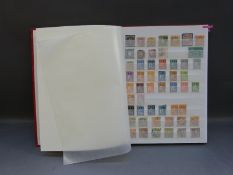 A stockbook of mint and used stamps from Spain and Portugal including colonial