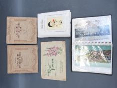 Two albums of postcards,