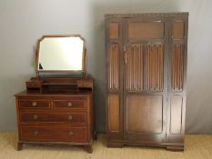 A late 19thC/early 20thC dressing table (H165 x W107 x D56cm) and oak wardrobe (H185 x W107 x