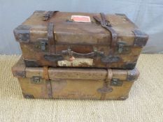 Two leather travelling trunks/cases both with H.J. Cave & Son, London, label to inside of lid.