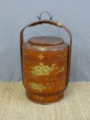 An oriental three tier food carrier