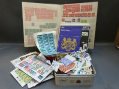 Two tins and a stockbook of mostly mint QE pre decimal stamps