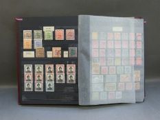 A stockbook containing a mint and used collection of GB and commonwealth stamps QV - QE including