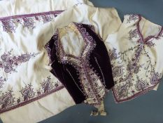 Edwardian ladies jacket finished in mauve and purple with bead and sequin decoration to the front