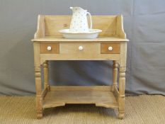 A vintage pine galleried back wash stand with jug and bowl (H94 x W83 x D48cm)