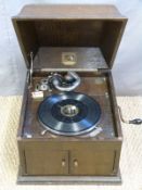 HMV model 103 table top wind up gramophone in oak case and a quantity of contemporary Shellac