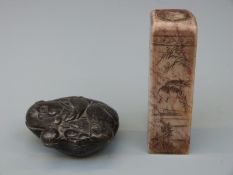 A Japanese bronze box in the form of a monkey decoration and a rectangular soapstone seal,