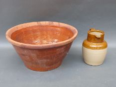 A half gallon stoneware jug marked GPO and a large country style pancheon bowl diameter 46cm