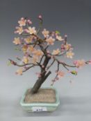 A celadon glaze pot with a rose quartz prunus tree 25cm tall